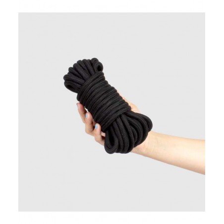 Corde bondage noire : vue dans main